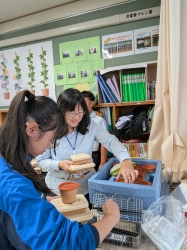 写真：区長の訪問の様子